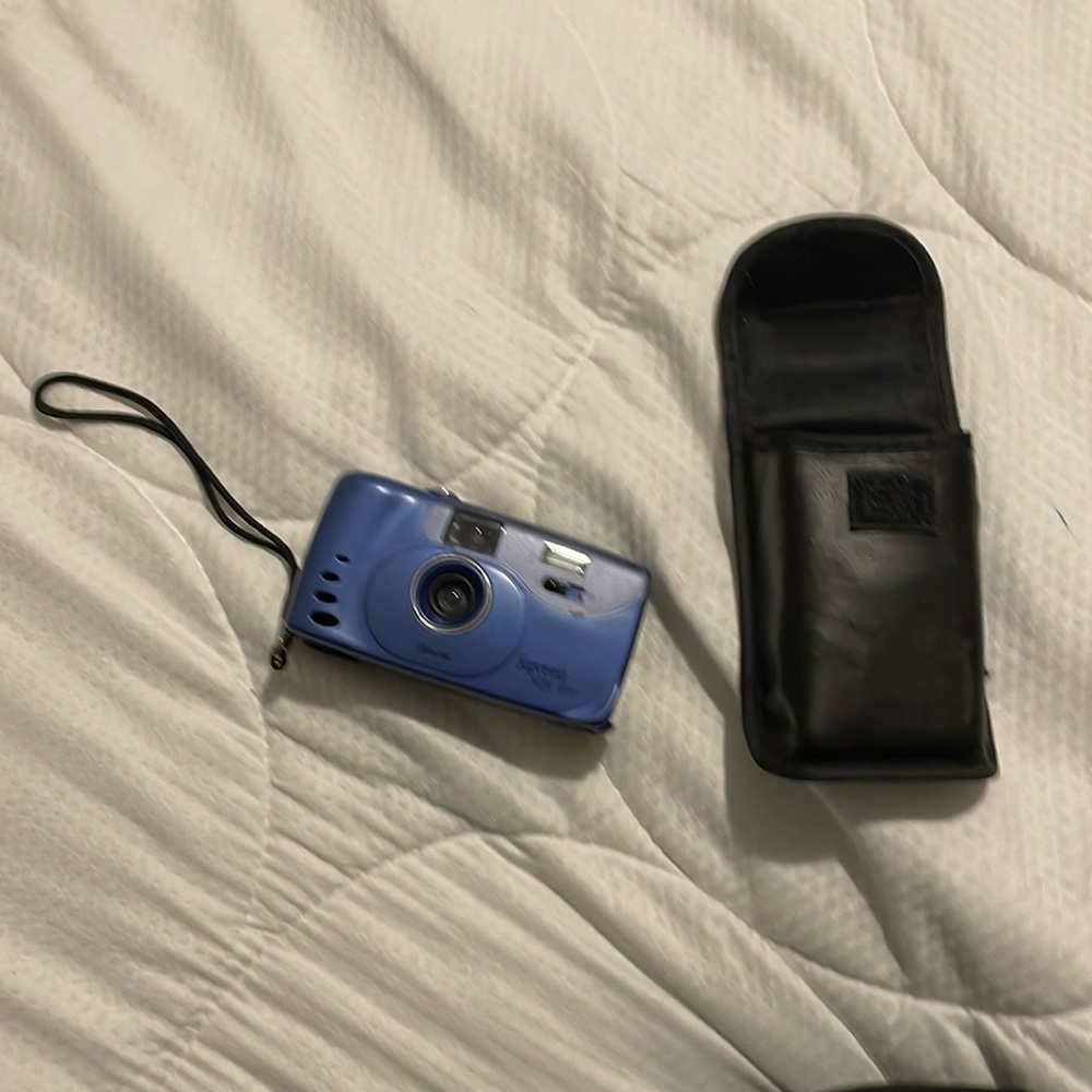 Brand:Suprema mini GTG,28 mm lens with case, light easy to carry, nice pic.